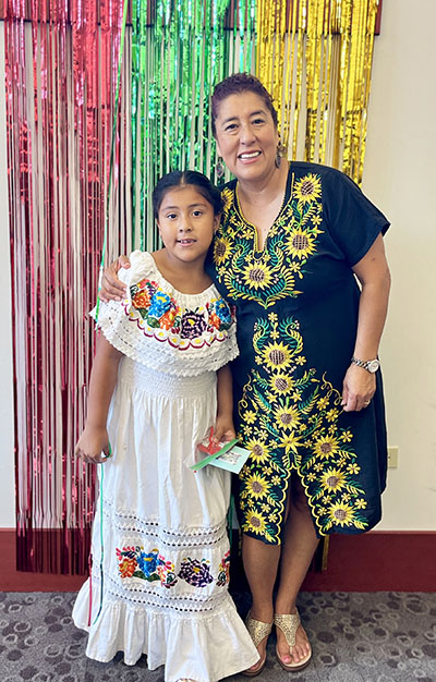 Linda Alvarez, left, and her mother, Ana, at Flossmoor Library’s first Hispanic Heritage Month celebration. (Nuha Abdessalam/H-F Chronicle)
