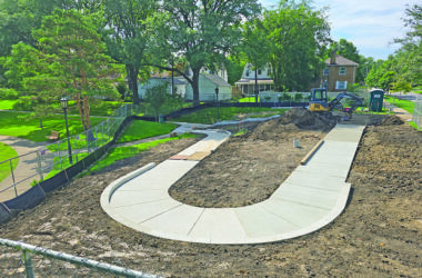 The new ADA-compliant ramp is under construction in this Aug. 23 photo. The ramp is designed to make Irwin Park more accesssible from the west side Gottschalk Avenue entrance, which previously included only stairs. (Eric Crump/H-F Chronicle)
