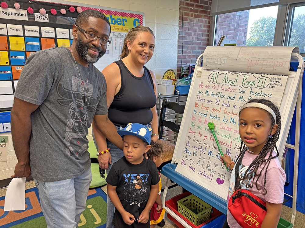 Parents Steve and Janessa Bryant attended the Willow School open house where their daughter Jianna, a first grader, read them a story the class wrote. With them are the couple's other children Trey (in hat), and Jaliya. (Marilyn Thomas/H-F Chronicle)