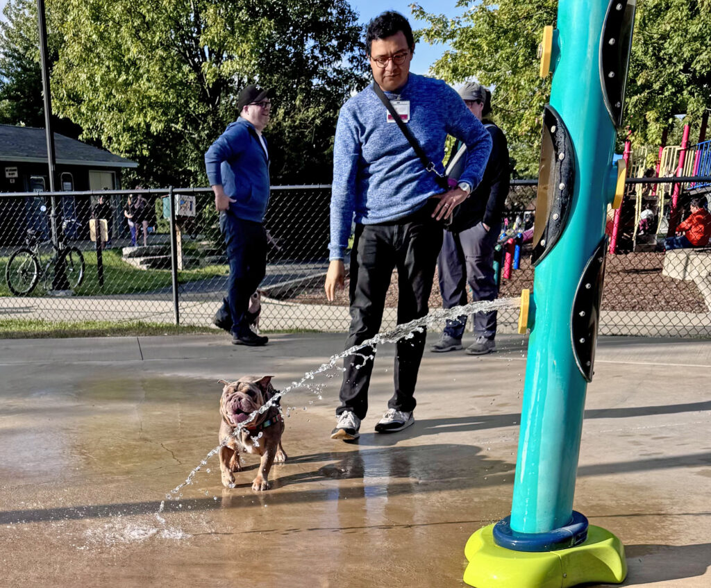Meatball and her owner Eric Rios of Flossmoor at the splash pad. (Karen Torme Olson)