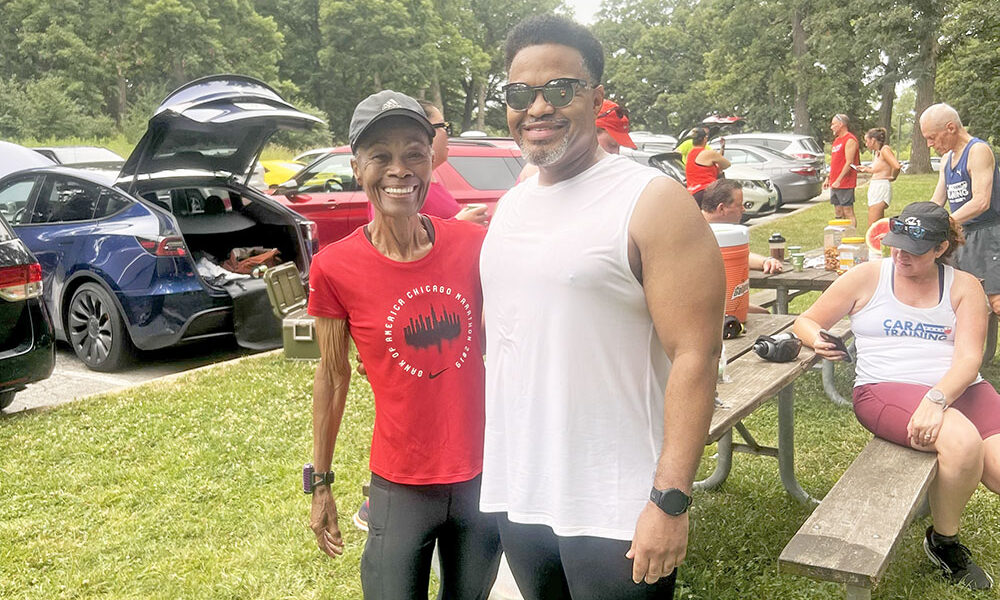 Flossmoor runner Tamerra Buckhanan, left, inspired her nephew Randall Gray of Flossmoor to take up running. She will run her 12th and Gray his first Chicago Marathon on Oct. 12. (Provided photo)