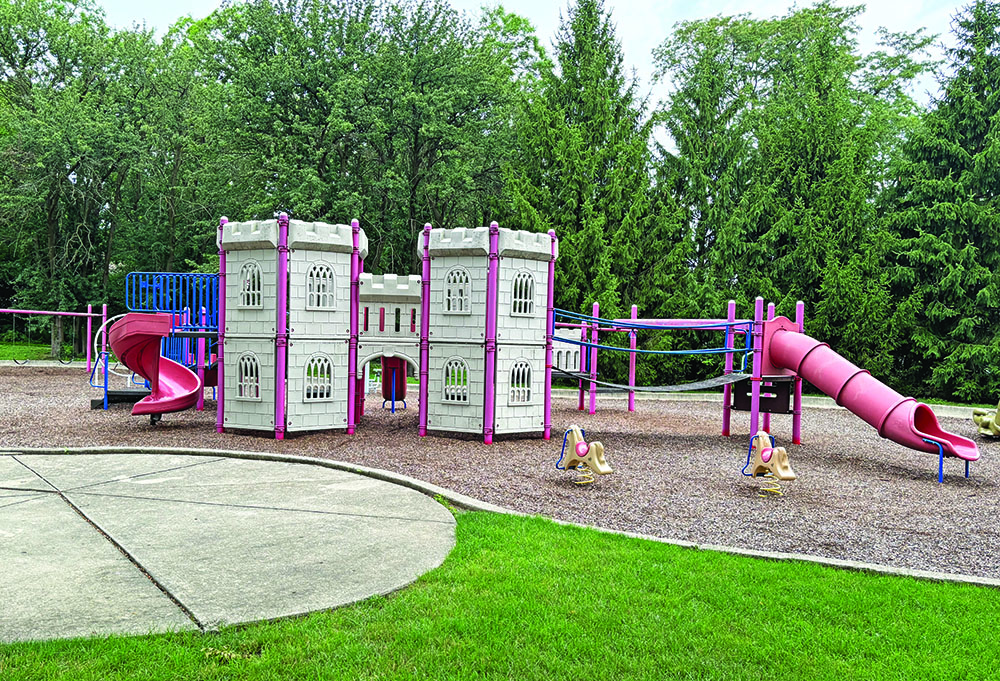 The old castle-themed playground equipment at Goldberg Park has been replaced by a new structure with a zipline. (Marilyn Thomas/H-F Chronicle)
