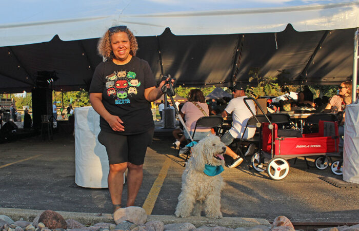 Festival regulars Theresa Harris and her golden doodle, Bailey, are back for another year of OAKtoberfest fun in Flossmoor. (Nuha Abdessalam/H-F Chronicle)