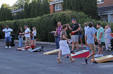 Nothing but (hopefully) net. Bean bags fly during the OAKtoberfest tournament in Flossmoor. (Nuha Abdessalam/H-F Chronicle)