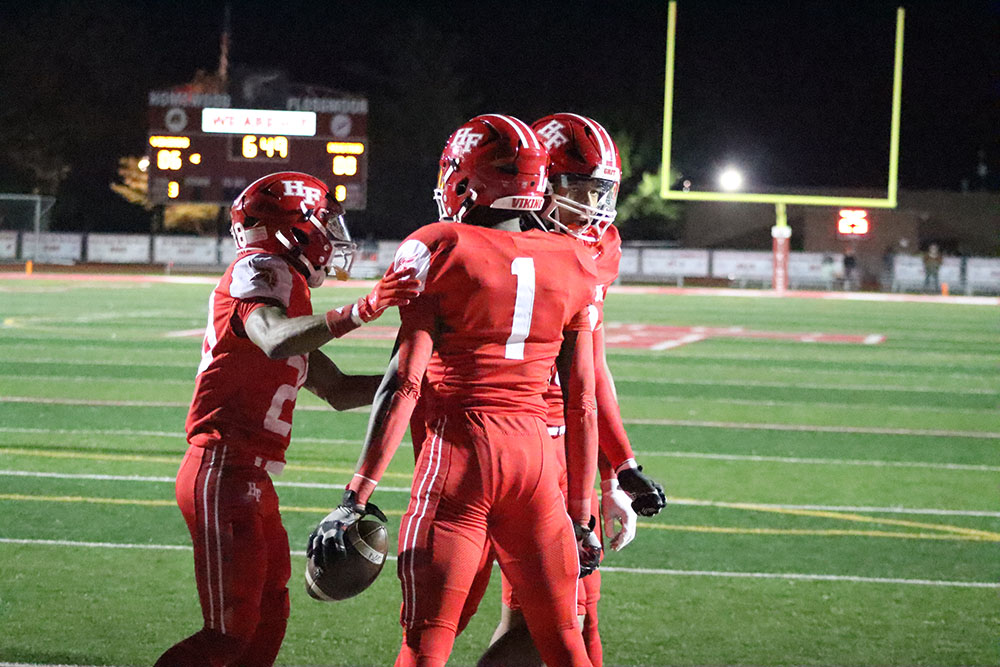 Senior Joaquin Jordan (1) sparks the Vikings' offense with his first rushing touchdown of the day, setting the tone early. (Benjamin Faoro/HF Chronicle)