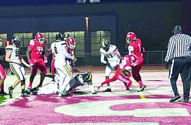 Senior Kourtney Smith scores on a 10-yard run in Homewood-Flossmoor's 50-8 win over Metea Valley Friday. (David P. Funk/H-F Chronicle)