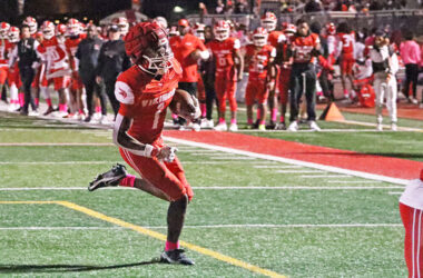 Joaquin Jordan (1) runs left into the end zone to give the Vikings their first points of the day. (Benjamin Faoro/H-F Chronicle)