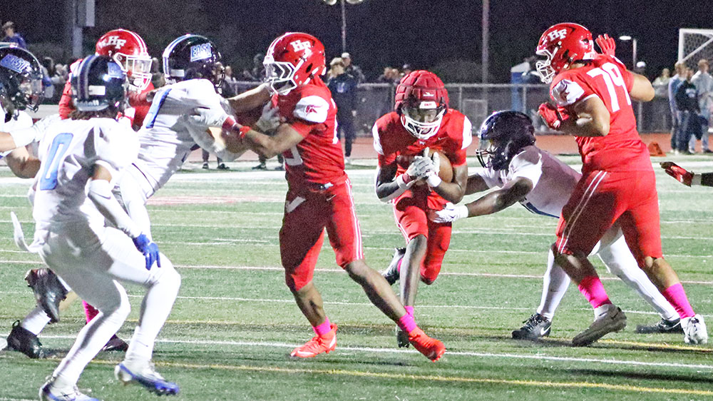 Joaquin Jordan (1) breaks through the hole to bring the Vikings down to the 1-yard line. (Benjamin Faoro/H-F Chronicle)