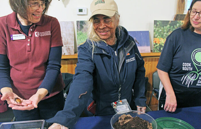 A millipede crawls on Karen McCray's arm. (Nuha Abdessalam/H-F Chronicle)