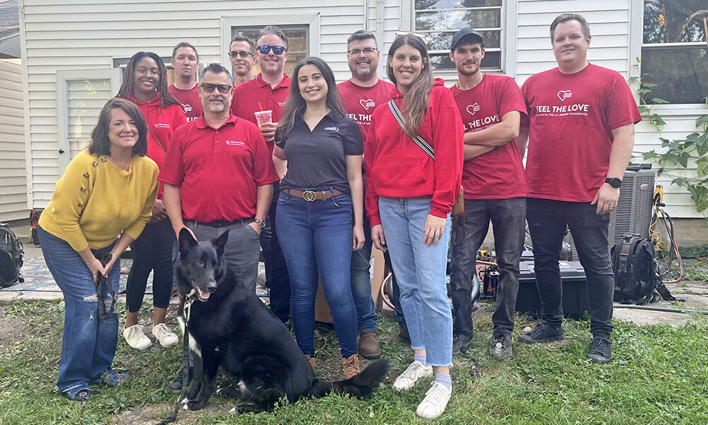 Homewood resident Jessica Gadomski, far left, outside her home with Hoekstra HVAC ownership and staff and Lennox territory manager Jennifer Simko, center. (Nick Ulanowski/H-F Chronicle)