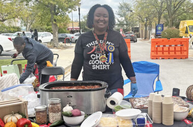 First place winner in the chili cooking contest, Toyia Mcwilliams, at her booth at Homewood Fall Fest. (Nick Ulanowski / H-F Chronicle)