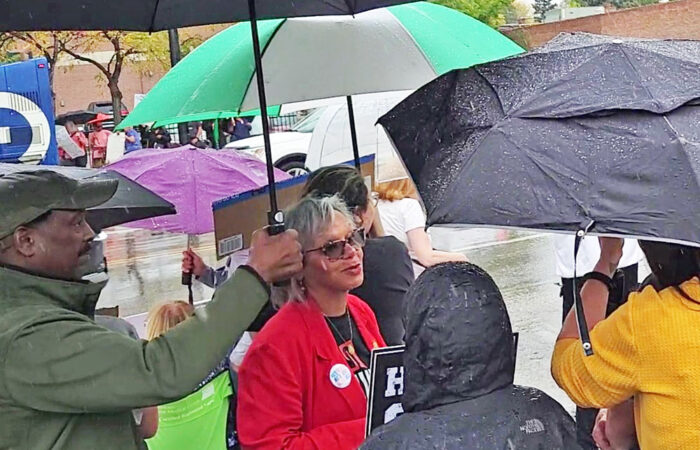 U.S. Rep. Robin Kelly talks with protesters on Western Avenue in the Beverly neighborhood during the No Kings demonstration on Oct. 18. (Eric Crump/H-F Chronicle)
