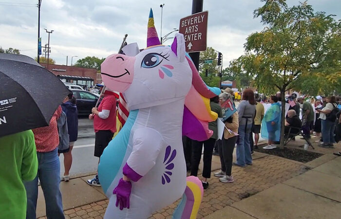 One protester came to the No Kings demonstration in an inflatable unicorn costume, a practice started in Portland, Oregon earlier in October. (Eric Crump/H-F Chronicle)