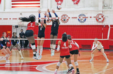 Clemson commit Ihuoma Ozoh (7) sets up for a kill as the Vikings gain momentum during the first set. Despite the surge, the Vikings fell later in the match. (Benjamin Faoro/HF Chronicle)