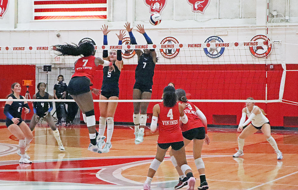 Clemson commit Ihuoma Ozoh (7) sets up for a kill as the Vikings gain momentum during the first set. Despite the surge, the Vikings fell later in the match. (Benjamin Faoro/HF Chronicle)