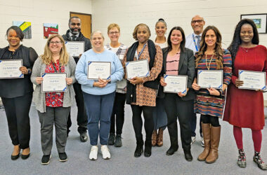 District 161 principals and assistant principals recognized for National Principal Month. Back row, from left, Cameron Small, Michelle Wisniewski, Seena Purham and Superintendent Dana Smith. Front row, from left, Evita McNeil-Dobson, Carol Humm, Beth Reich, Ursula Parris, Abby Girard, Laura Rodriguez and Deborah Dunwoody. (Chris Weber/H-F Chronicle)