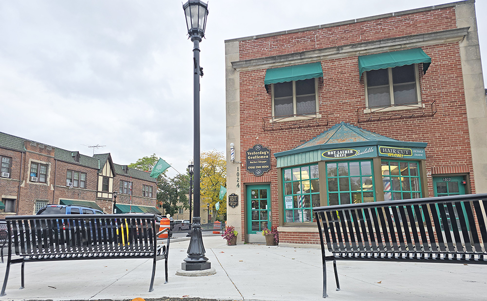 New benches, and more of them, are part of the upgrade to Flossmoor's downtown streetscape. Village officials will celebrate the completion of the project on Saturday, Nov. 29. (Eric Crump/H-F Chronicle)
