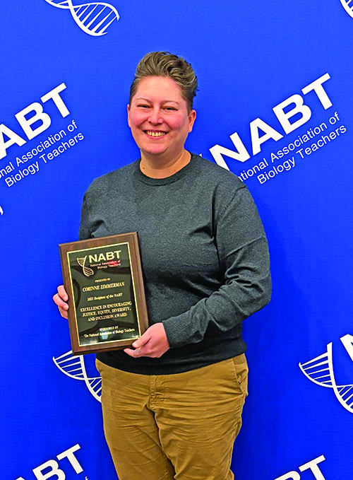 H-F teacher Corinne Zimmerman with her JEDI Award presented for her special efforts with students. (Provided photo)