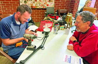 Homewood-Flossmoor High School teacher Bill Merchantz, left, was able to repair two lamps for Flossmoor resident Dave Carvalho. (Marilyn Thomas/H-F Chronicle)