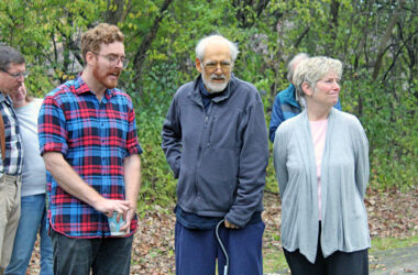 Emmett Houlihan speaks to the group as Tom and Patty Houlihan stand with him during the ceremony. (Nuha Abdessalam/H-F Chronicle)