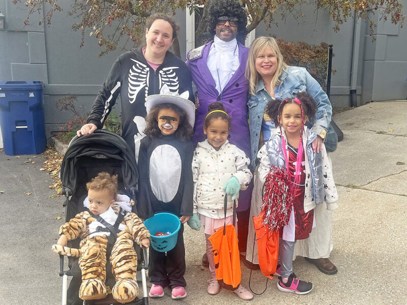 The Reaves and Thierry families trick or treat dressed in music-themed Halloween costumes. (Nick Ulanowski / H-F Chronicle)