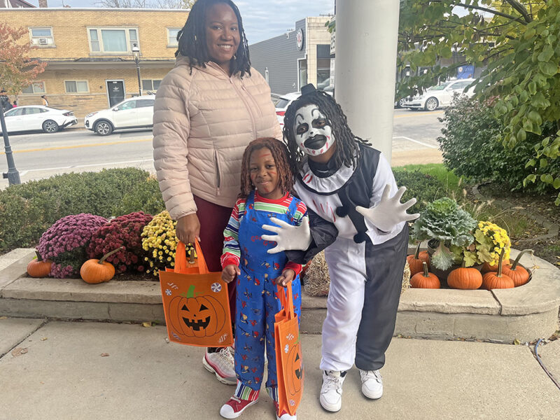 From left, Notasha Tarvet, Tajuan Wright in a Chucky costume and Jordan in a Terrifier costume. (Nick Ulanowski / H-F Chronicle)
