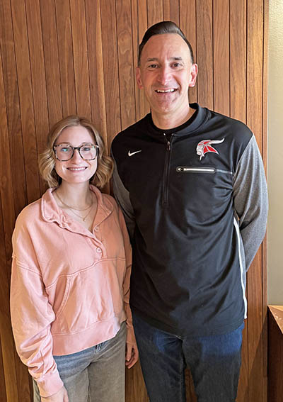 Maddy Zirbel meets with Homewood-Flossmoor High teacher Dane Noble, president of the Homewood-Flossmoor Education Organization, to discuss her upcoming student teaching. Zirbel is an HFEO scholarship winner. (Marilyn Thomas/H-F Chronicle)