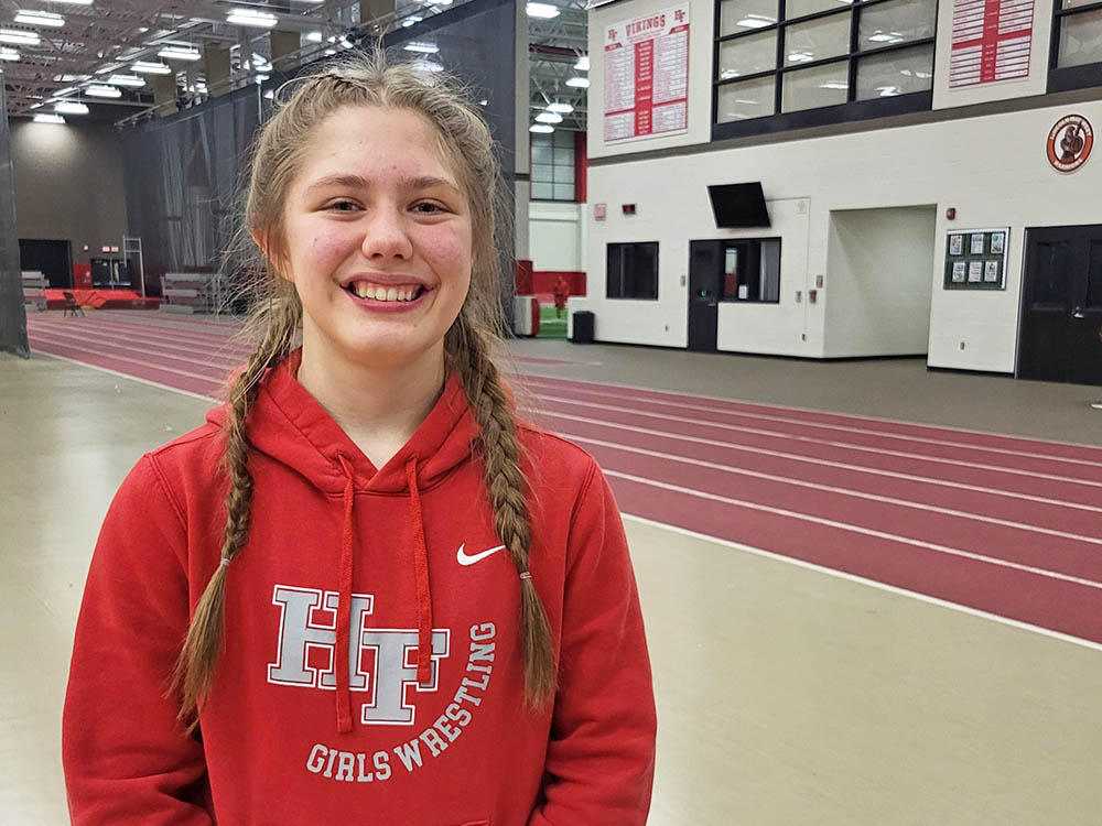 Madelynn McClements is everybody's friend, and that's exactly what Homewood-Flossmoor wrestling needs her to be. (David P. Funk/H-F Chronicle)