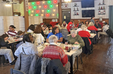 Homewood-Flossmoor High School seniors and volunteer elders join forces for the annual Santa's Senior Helpers project sponsored by the H-F Park District and the villages of Homewood and Flossmoor. (Jon Bannister/H-F Chronicle)