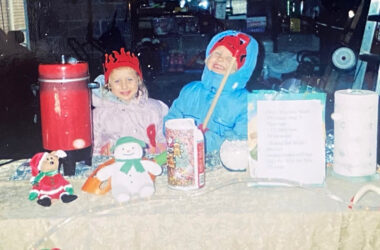 Mara and Kayla Winfrey at ages 2 and 4 during their very first hot chocolate stand, a small front-yard setup that grew into a 22-year Toys for Tots tradition. (Provided photo)