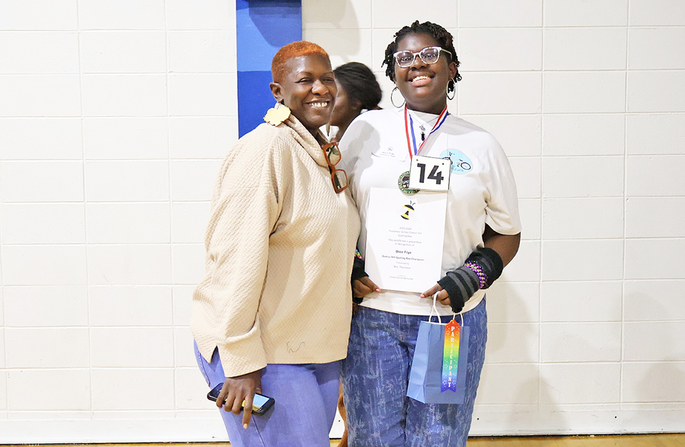 Bree Frye, right, poses with her mom, La Frye, after winning the District 161 spelling bee. One proud moment, times two. (Nuha Abdessalam/H-F Chronicle)