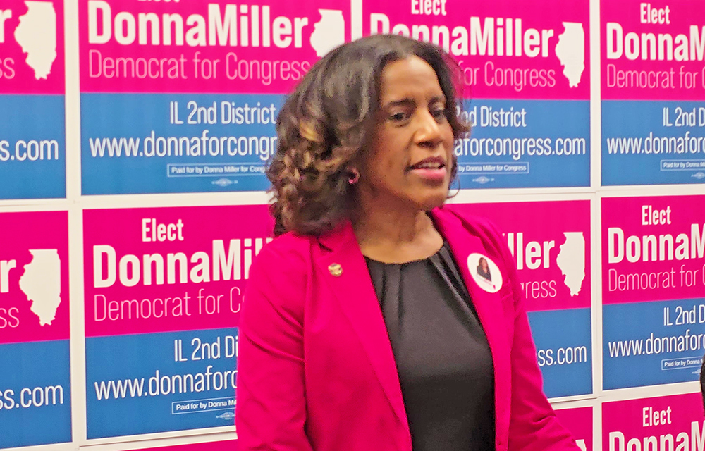 After cutting the ribbon to open her campaign office in Flossmoor, Donna Miller talks about what her priorities will be if she is elected to Congress. (Eric Crump/H-F Chronicle)