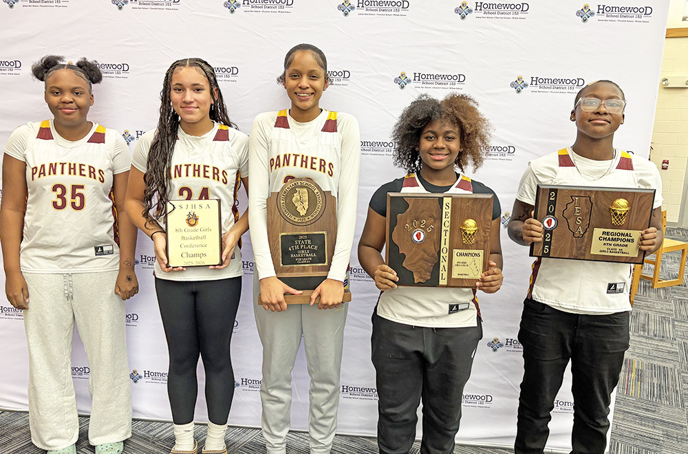 Members of the James Hart School eighth grade girls basketball team came home with several trophies, including fourth place in state competition. Proudly showing off their awards are, from left, Kendalyn Walker, Skylar White, Gavynn Hall, Taja White and Nora-Rose Coleman. (Marilyn Thomas/H-F Chronicle)