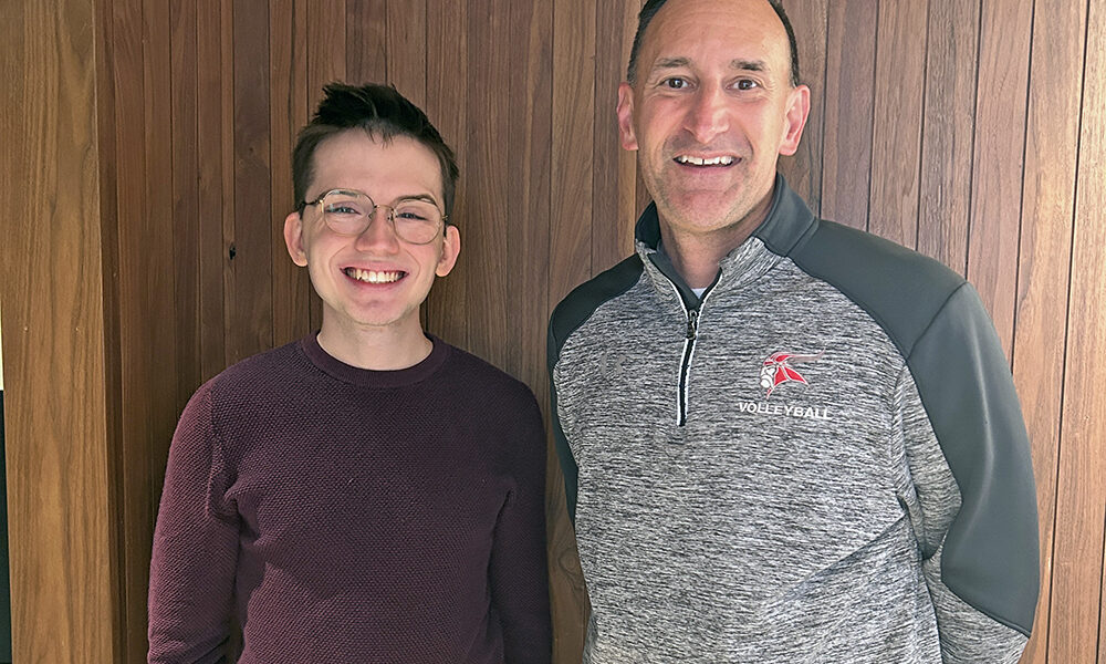 Homewood-Flossmoor High graduate Sam Calhoon, left, recently met with Dana Noble, president of the H-F Education Organization, the teachers' union. The union is providing Calhoon with a stipend to support him during his student teaching work this semester. (Provided photo)
