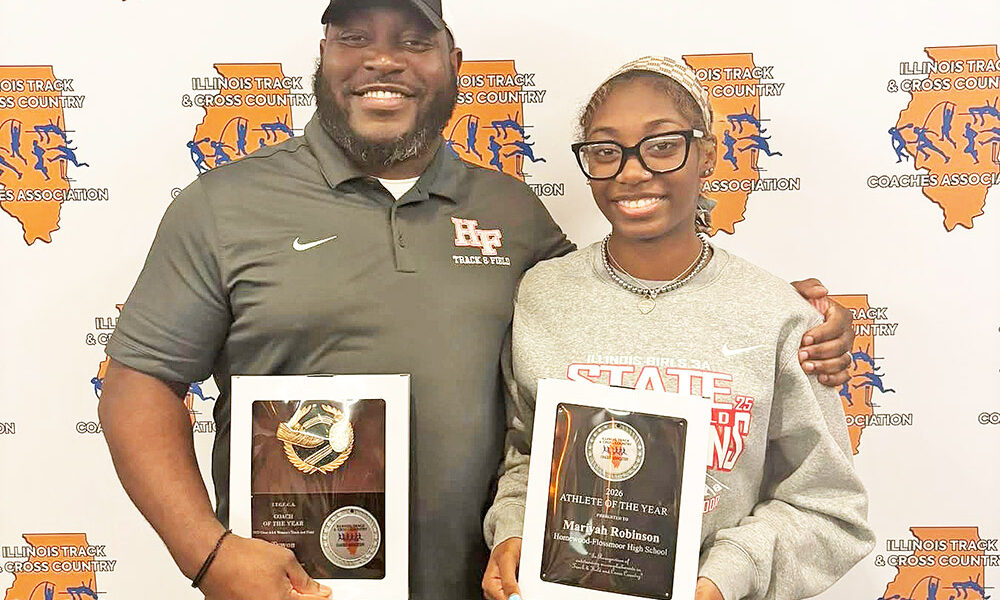 Coach Tywon Green and sprinter Mariyah Robinson pose with their awards fom the Illinois Track and Cross Country Coaches Association. (Provided photo)