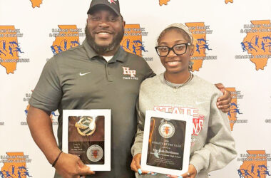 Coach Tywon Green and sprinter Mariyah Robinson pose with their awards fom the Illinois Track and Cross Country Coaches Association. (Provided photo)