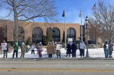 Community demonstrators rally in front of the Homewood Veterans Memorial on Martin Luther King Day, protesting the actions of the Trump administration and U.S. Immigration and Customs Enforcement (ICE). (Nick Ulanowski / H-F Chronicle)