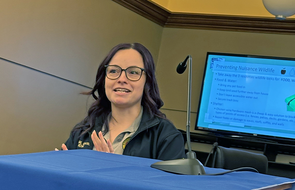 Rebecca Koval, animal control officer in Glenwood, addresses issues of wildlife living among us at a Jan. 10 program. (Marilyn Thomas/H-F Chronicle)
