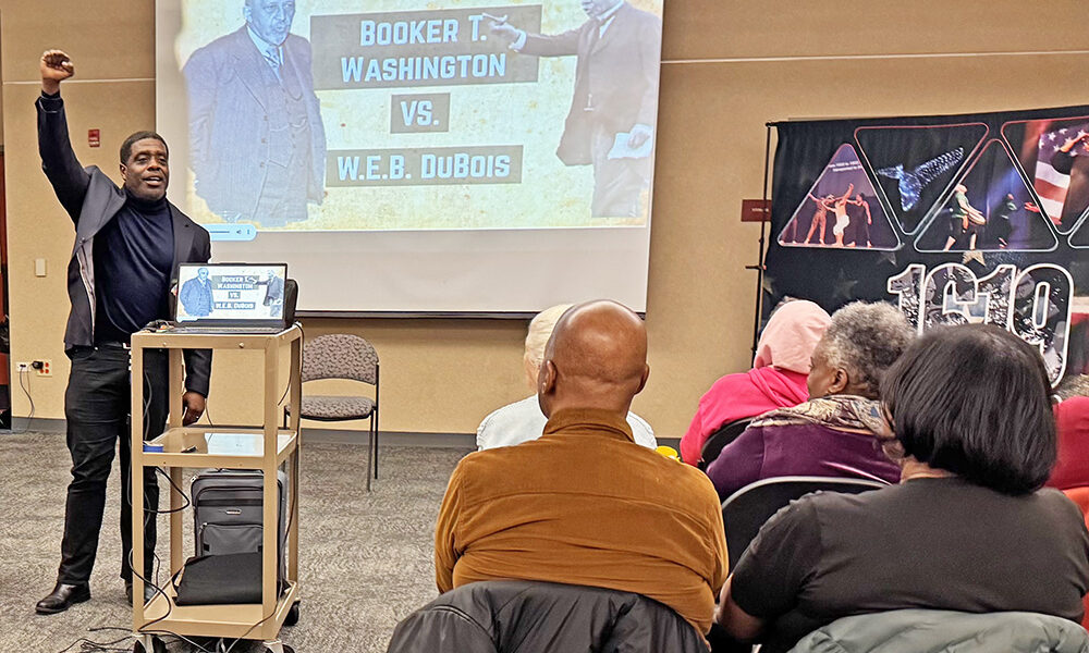 Ted Williams III compares the philosophies of Booker T. Washington and W.E.B. Dubois during his Feb. 18 presentation. (Karen Torme Olson)
