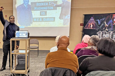 Ted Williams III compares the philosophies of Booker T. Washington and W.E.B. Dubois during his Feb. 18 presentation. (Karen Torme Olson)