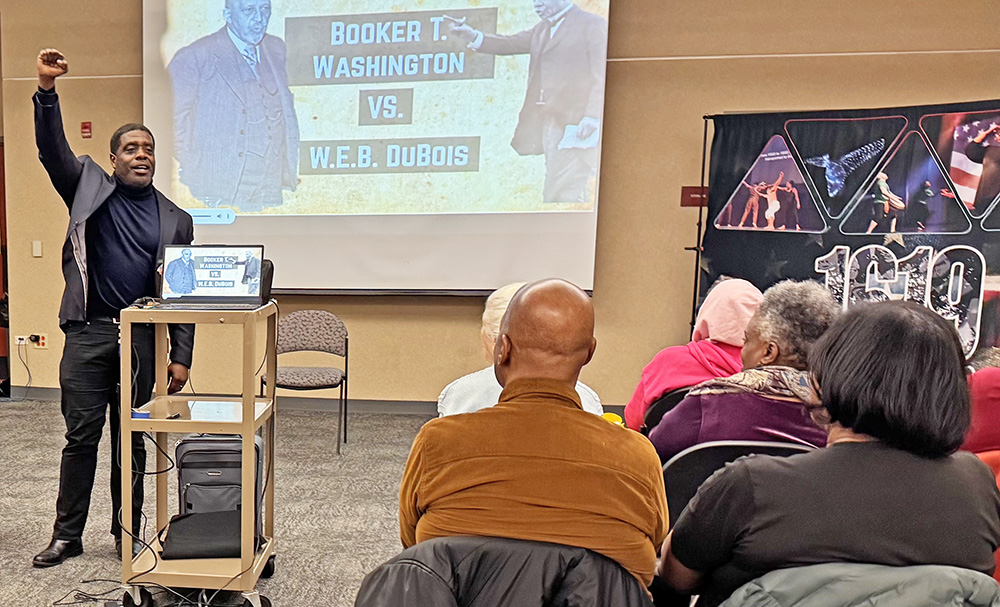 Ted Williams III compares the philosophies of Booker T. Washington and W.E.B. Dubois during his Feb. 18 presentation. (Karen Torme Olson)