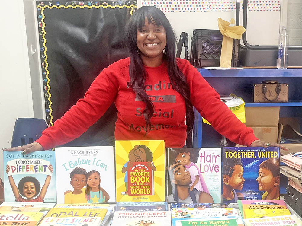 Da Book Joint co-owner Courtney Woods at the Black History Month Book Fair. (Nick Ulanowski / H-F Chronicle)