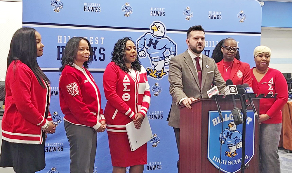 From left, Tasha Gibson White, Natalie Watson, County Clerk Monica Gordon, Bremen School District Social Studies Supervisor Ryan Nagle, Deadra Woods Stokes and Bose Clodfelter help announce the Defenders of DA'mocracy project during a news conference at Hillcrest High School. (Eric Crump/H-F Chronicle)