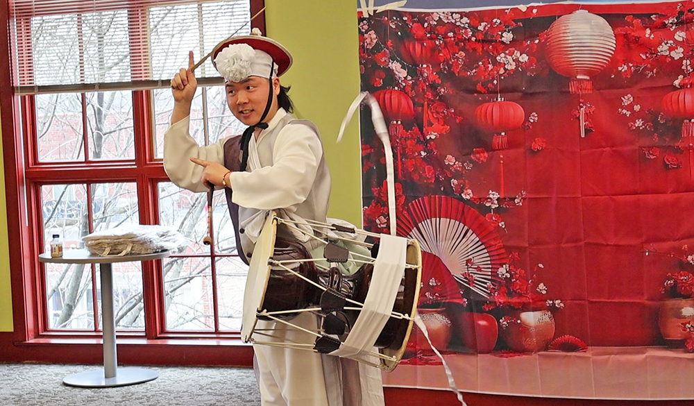 Korean drumming performer Chansoo Lee entertains at the Lunar New Year celebration Saturday, Feb. 14, in Flossmoor Public Library. (Nuha Abdessalam/H-F Chronicle)