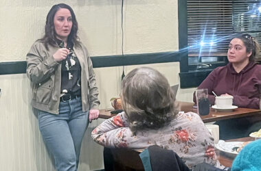 Activist Liz Varmecky speaks at the Chicago Southland Green Drinks event Monday, Feb. 16, at Flossmoor Station Restaurant and Brewery. South Suburbs for Green Space member Rachel Smith looks on. (Nick Ulanowski / H-F Chronicle)