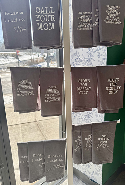 A display of hand towels with humorous messages makes customers smile at Gypsy Fix. (Karen Torme Olson/H-F Chronicle)