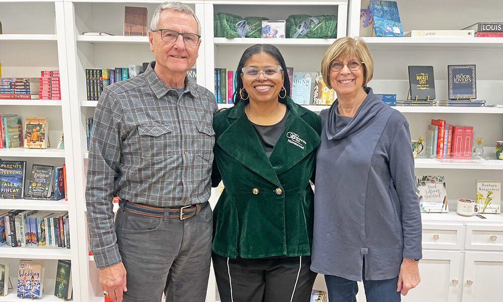 Dave Larsen, left, Beyond the Book owner Tenia Davis and Sally Larsen. Dave is a local author, and the Larsens volunteer at the new book shop. (Jamilah Lewis/H-F Chronicle)