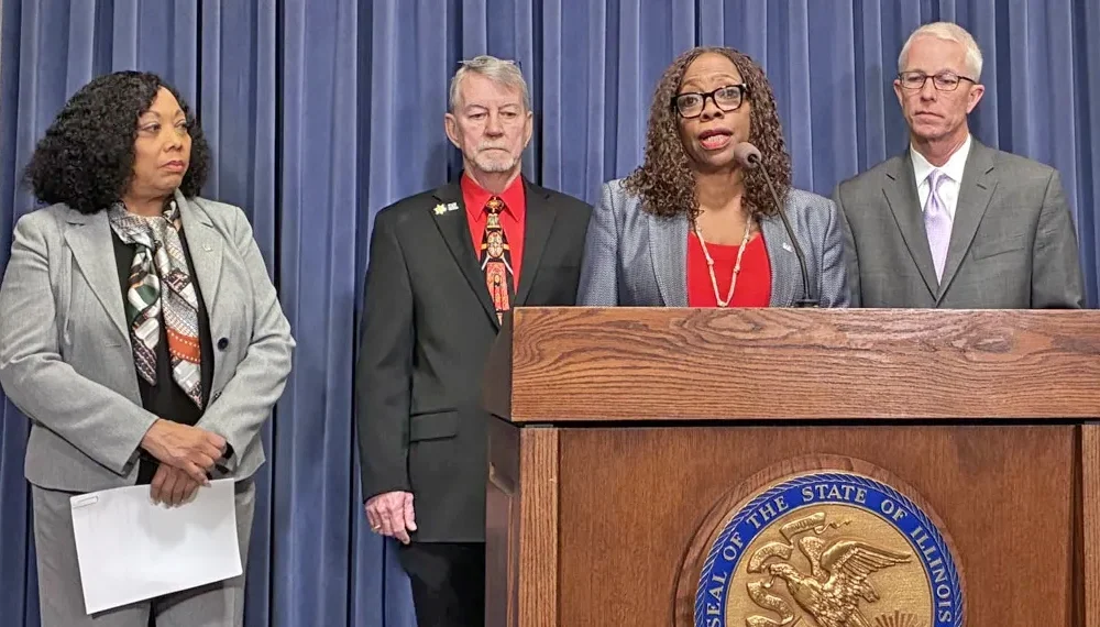 Matteson Village President Sheila Chalmers-Currin speaks alongside leaders of the Illinois Municipal League at a news conference in Springfield on March 4, 2026. (Capitol News Illinois photo by Ben Szalinski)