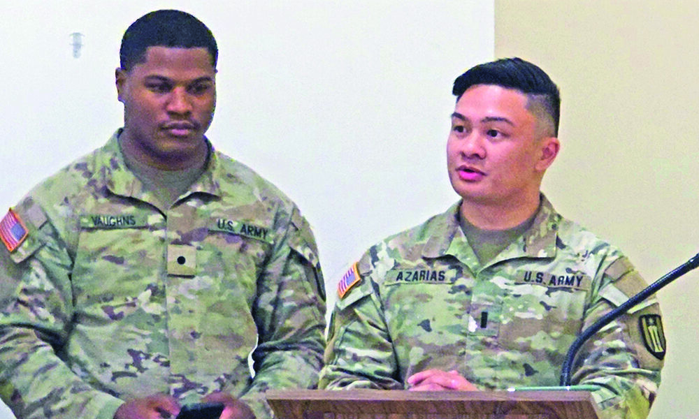 First Lt. Albert Azarias, right, delivers remarks at a change of command ceremony in December 2025. Azarias will serve as commander of the 317th Engineer Construction Company at the Army Reserve Center in Homewood. (Eric Crump/H-F Chronicle)