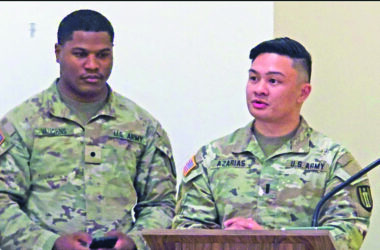 First Lt. Albert Azarias, right, delivers remarks at a change of command ceremony in December 2025. Azarias will serve as commander of the 317th Engineer Construction Company at the Army Reserve Center in Homewood. (Eric Crump/H-F Chronicle)